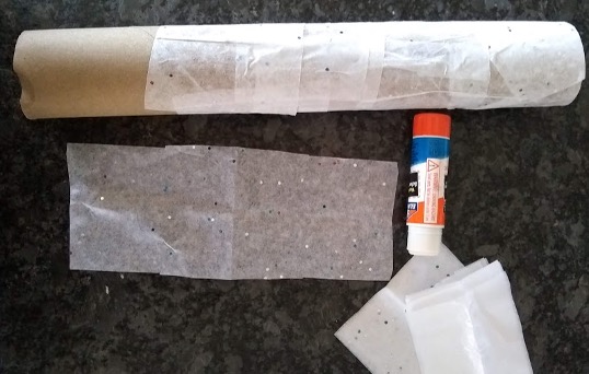 paper roll and glue stick