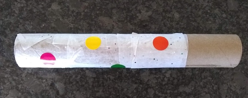paper roll wrapped with stickers