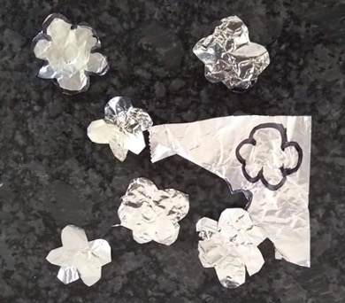 Aluminum foil cut into flower shapes