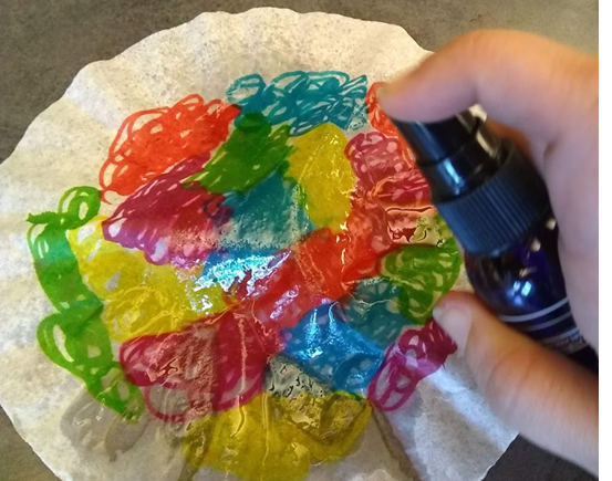 Spray the coffee filter with hand sanitizer
