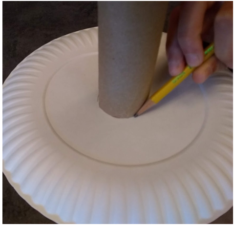 Trace around the paper towel tube.