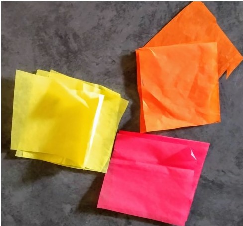 Cut the tissue paper into squares